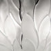 Large, decorative wall art with a textured, floral pattern, close-up of texture.