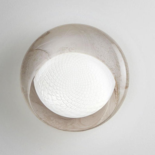 Large, modern wall sconce with a rectangular, metallic frame, angled view.