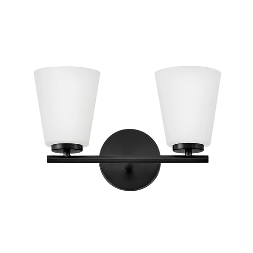 A modern outdoor wall lantern with a black finish and clear glass panels featuring a rectangular design.