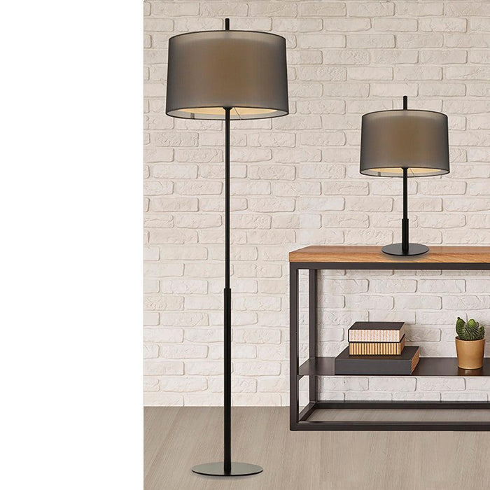 Black floor lamp with a conical fabric shade, angled view.
