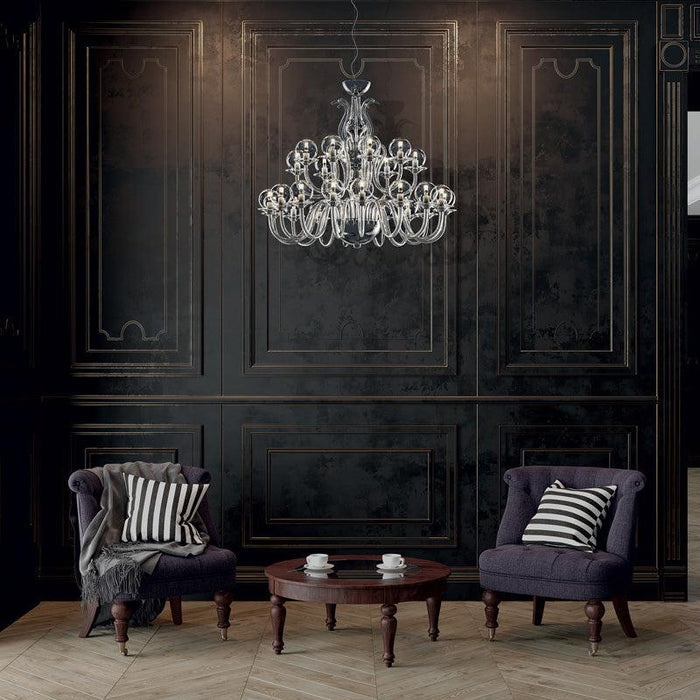 Large, modern wall sconce with a curved, metallic body, angled view.