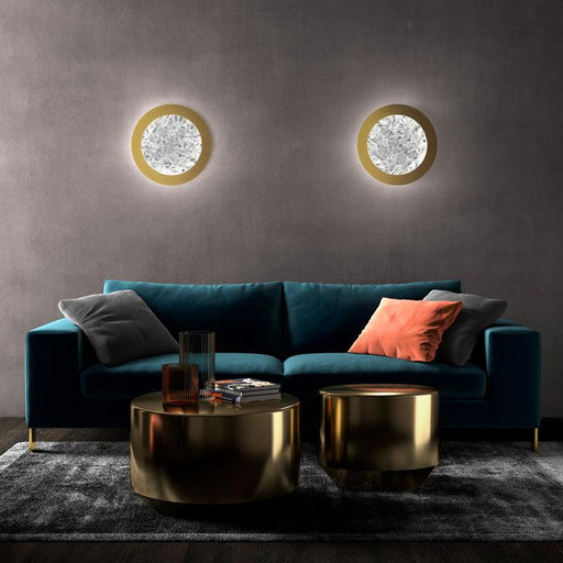 Large, modern wall sconce with a rectangular, metallic frame, angled view.