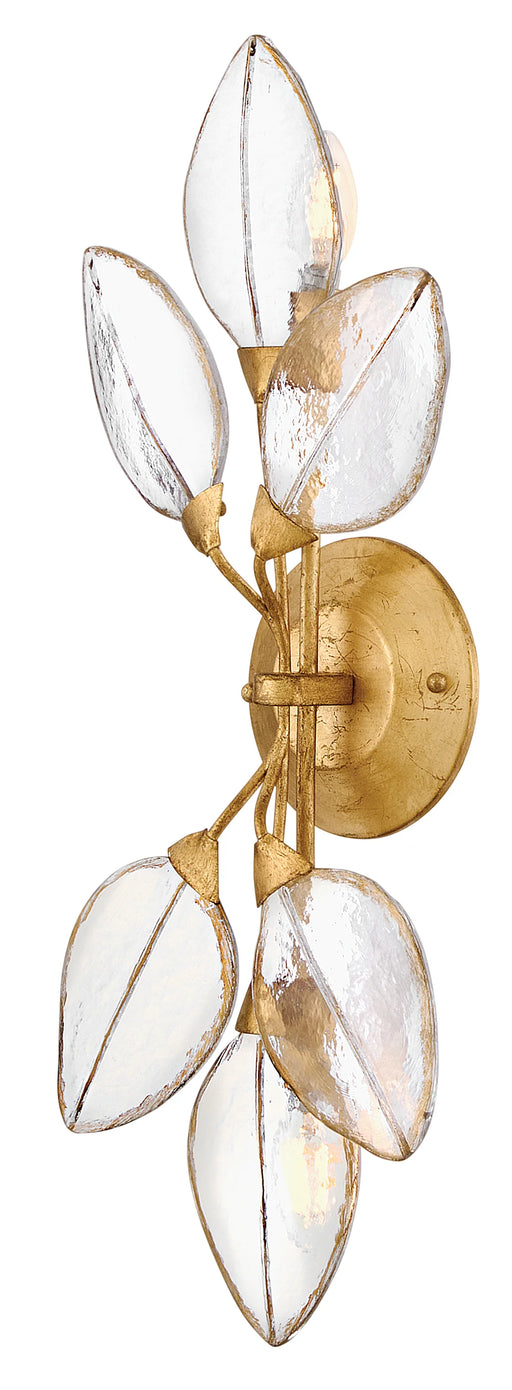 An angled view of a modern ceiling fan with dark wood-tone blades.
