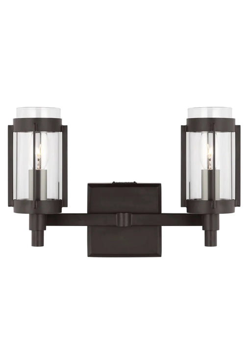 A modern semi-flush mount ceiling light with layered circular rings in an aged iron finish and a white diffuser.