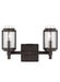 A modern semi-flush mount ceiling light with layered circular rings in an aged iron finish and a white diffuser.